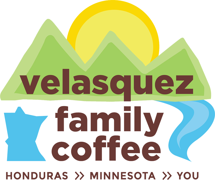 Logo of Velasquez Family Coffee featuring green mountains, a yellow sun, a blue star and river, with text 'Honduras >> Minnesota >> You.